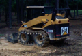 Skid Steer Spreading Dirt